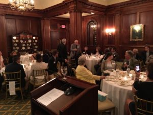 A speaker at the podium during the spring dinner